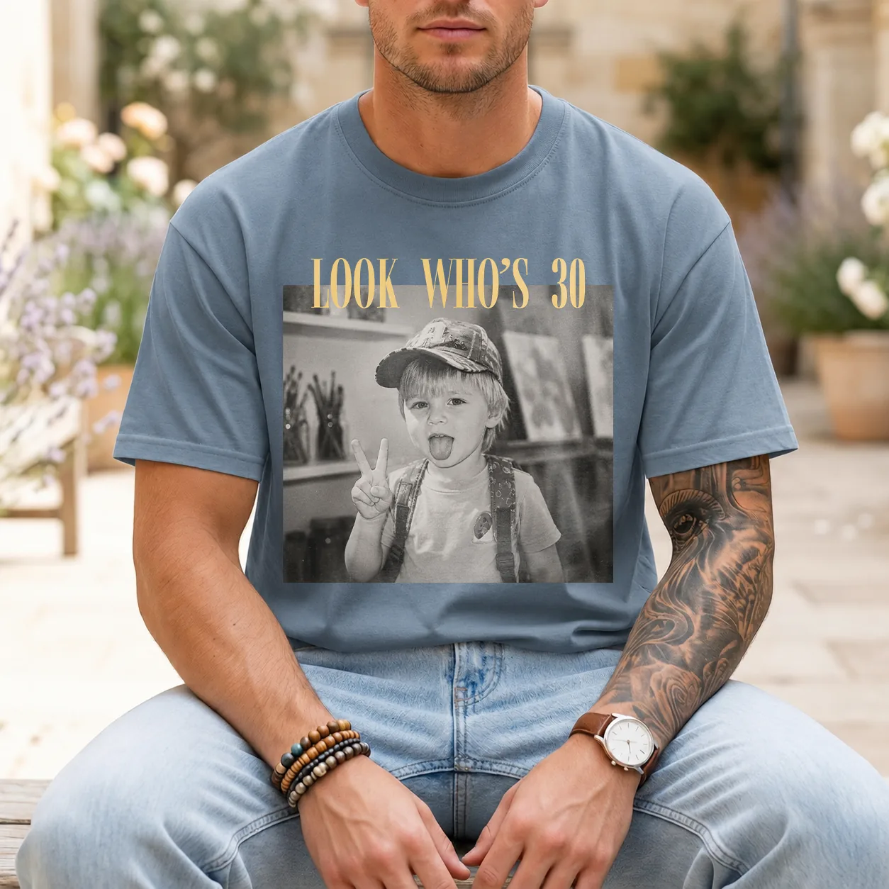 Personalized birthday shirt worn by a male model in Comfort Colors Blue Jean