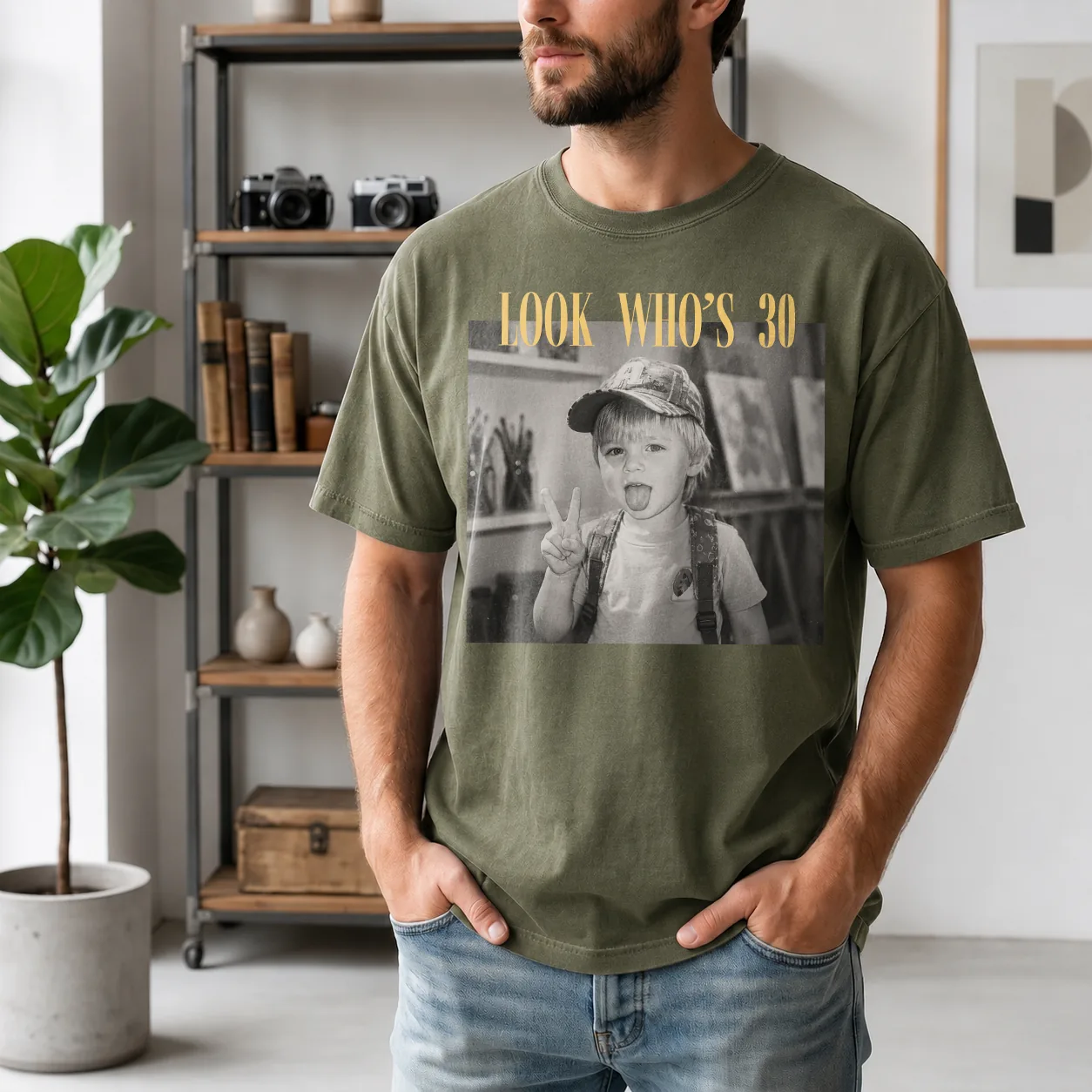 Personalized birthday shirt worn by a male model in Comfort Colors Moss (dark green)