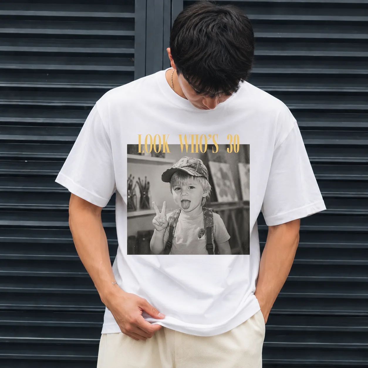 Personalized birthday shirt worn by a male model in Comfort Colors White